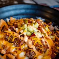 Bacon Cheeseburger Mac & Cheese · Seasoned ground beef, cheddar cheese, bacon bits, and diced pickles drizzled with Sickies’ s...