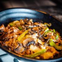 Philly Mac & Cheese · Savory pot roast with sautéed onions, green peppers, and mushrooms, served over creamy white...