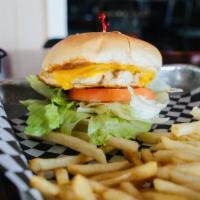 Chick In A Coupe · Classic grilled chicken sandwich with American cheese, lettuce, and tomatoes.