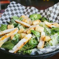 Chicken Caesar Salad · Classic bed of fresh romaine lettuce, grilled chicken, shredded parmesan cheese, garlic crou...