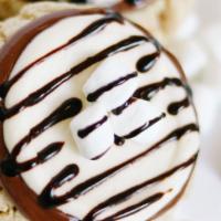 S'Mores · A graham cracker sugar cookie topped with a thin layer of Nutella, marshmallow cream frostin...