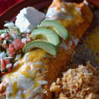 Shrimp Fajita Burrito · A large flour tortilla filled with Shrimp, bell peppers, onion, mushrooms. and served with r...