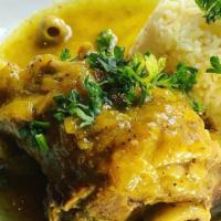 Tagine Of Lamb · Slow-cooked and oven-baked chicken, served over a Moroccan sauce with fresh-baked bread and ...