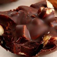 Chocolate Almond · Slice of almond on chocolate frosting