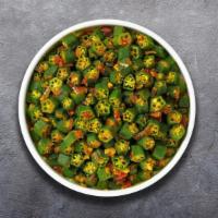 Bhindi Binding Masala · Fresh okra with sliced onions, herbs and mild spices. Served with rice.