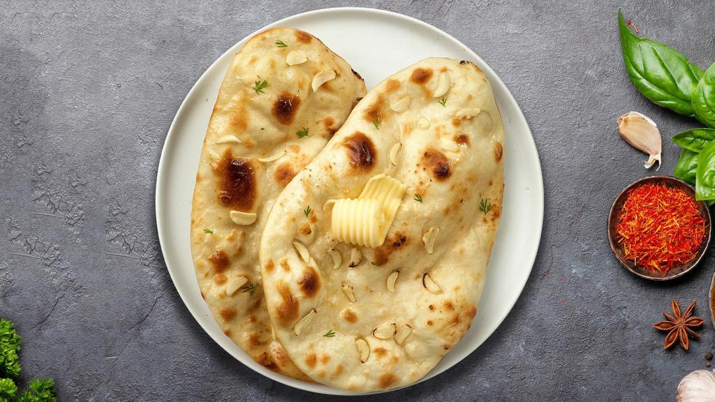 Naan Better Than · Leavened flatbread made from white flour, cooked until puffy and blistering, then coated in butter and garlic