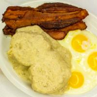 Country Breakfast · Three fresh cracked eggs cooked any style with your choice of three bacon or three sausage a...