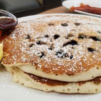 Blueberry · Juicy blueberries baked right into two pancakes. topped with powdered sugar.
