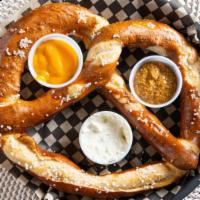 Big A@# Pretzel · Giant Bavarian Pretzel served with House made Beer cheese , and stone ground mustard.
