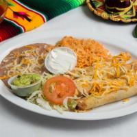 Rolled Taquitos Plate · Four rolled chicken or beef taquitos topped with cheese and served with a side of guacamole ...