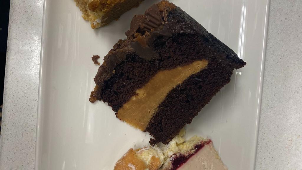 Cake Flight- 3 Slices  · Choice of 3  slices of eight different choices. 1. Passion Fruit Coconut Cheesecake  2. Chocolate Cake 3. Strawberry Cream    4. Raspberry Donut Cheesecake 5.Raspberry Lemon Cheesecake