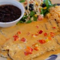 Pollo Al Carbon · Boneless charbroiled chicken breast, topped with signature chipotle cream sauce. If you requ...