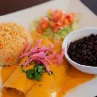 Enchiladas En Salsa De Habanero · New. Two hand-made corn tortillas filled with chicken carnitas, finished with a delicious ro...