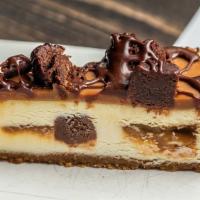 Caramel Brownie Bite Cheesecake · Fudgy brownies and creamy cheesecake deliciously conspire to deliver a classic Americana mas...