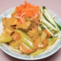 Bún Đậu Hũ Cà Ri · Curry tofu served with rice vermicelli noodle and fresh vegetables.