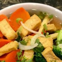 Tofu Rice Noodle Soup · Choice:Fried Tofu OR Fresh Tofu.
Rice Noodles, Mixed vegetables,Yellow Onion,Green Onion, Ci...