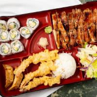 Large Bento · White rice, green salad, gyoza, your choice of entrée, and choice of roll.or Tempura.