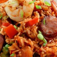 Jambalaya · Gluten free. A rice dish with andouille sausage, chicken, shrimp, tomatoes, onions and bell ...