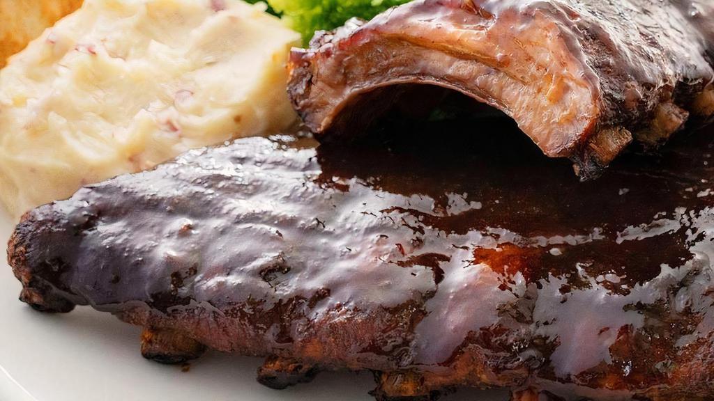 Bbq St. Louis Ribs · Half rack, beer braised and smoked.