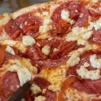 Salami · Tomato sauce, Mozzarella, Salami, Ricotta, Roasted Red Peppers, Drizzled with Spicy Honey