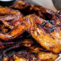 Chicken Wings · Six wings & ranch or blue cheese dressing. Sauces: house hot sauce, mild sauce, or BBQ sauce.