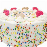 Birthday Cake Ice Cream Cake · Two layers of vanilla cake, interspersed with two layers of cake batter ice cream and sprink...