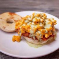 Buffalo Chicken Bagel · Crispy chicken cutlet, buffalo sauce, jalapeño ranch, and mac & cheese