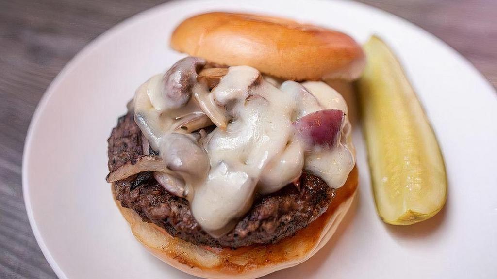 Patty Melt Bagel · Half pound certified Angus beef, Thousand Island, mushrooms, diced grilled onions, and Swiss cheese.