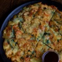 Seafood And Green Onion Pancake (해물파전) · Fried pancake filled with onions, green onions and shrimps. Comes with a sweet soy sauce and...