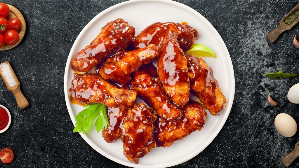 Bbq Buster Wings  Boneless) · Boneless breaded fresh chicken wings, fried until golden brown, and tossed in barbecue sauce. Served with a side of ranch or bleu cheese.