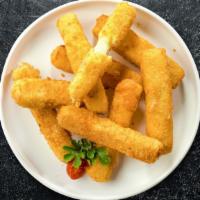 Guilty As Cheese Sticks · 10 Mozzarella cheese sticks battered and fried until golden brown.