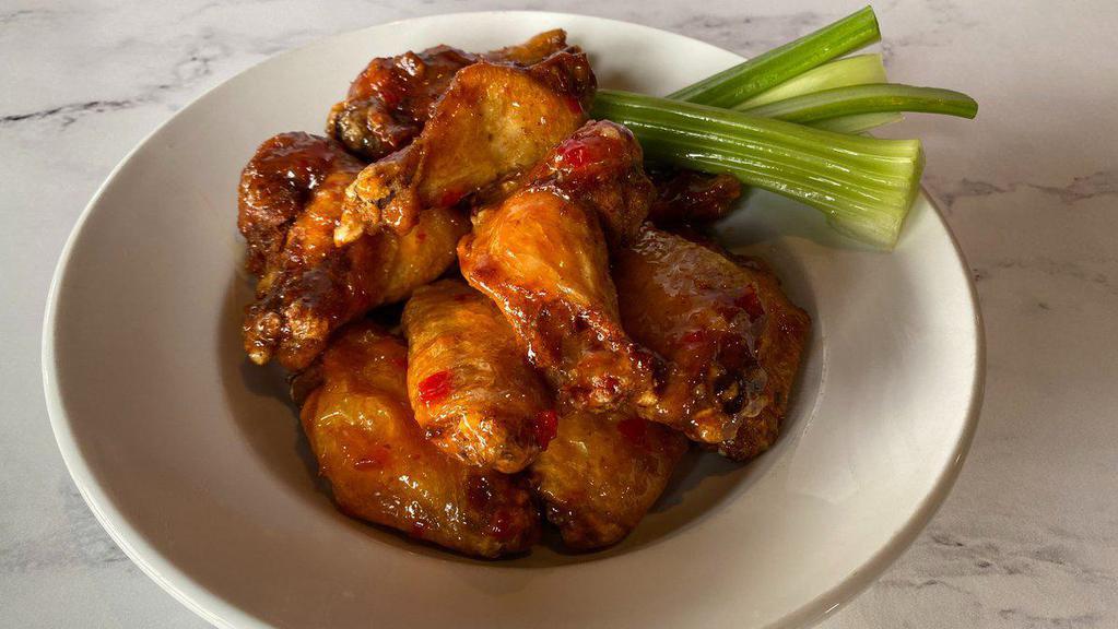 Chicken Wings · One full pound of wings tossed in buffalo, teriyaki, sweet chili or a spicy cajun rub.