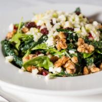 Walnut Spinach · spinach, candied walnuts, dried cranberries, apples, and crumbled cheese tossed in apple vin...