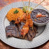 Surf & Turf Asada · Top grade skirt steak paired with bacon-wrapped succulent pranws, with pico de gallo, guacam...