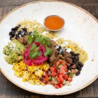 Gourmet Parilla Bowl · Mexican rice bowl with cilantro-lime rice, black beans, cheese, pico de gallo, guacamole, cr...