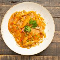 Arroz Con Pollo · Chicken breast, mushrooms, red and green bell peppers, cheese, arroz con pollo sauce
