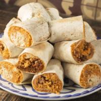 Burrito Wraps Platter · Portion of 6 burritos (12 Halves) Shredded chicken, barbacoa shredded beef or grilled veggie...