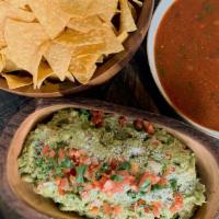 Guacamole Salsa & Chips Platter · For 10 guest. Add protions for 5 or more guest $15.99 Homemade crispy tortilla chips, chunky...