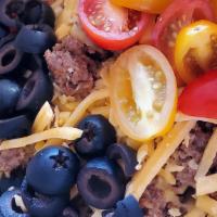 Taco Salad  · Iceberg, tomato, black olive, Cheddar cheese, refried beans, taco meat, tortilla chips, guac...