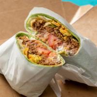 Taco Wrap · Iceberg, Tomato, Black Olive, Cheddar Cheese, Refried Beans, Taco Meat, Tortilla Chips, Guac...