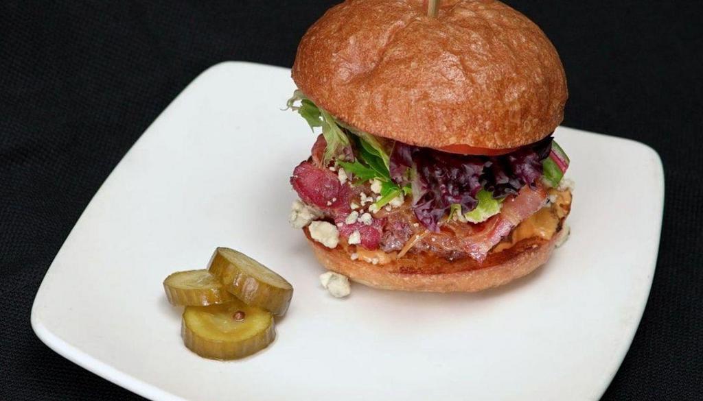 Bacon And Blue Burger · 100% grass-fed beef patty, crispy bacon, blue cheese, caramelized onion, lettuce, tomato, pickle