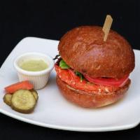Salmon Burger · House made patty, lettuce, tomato, red onion, spicy wasabi mayo, pickled ginger