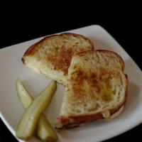 Grilled Cheese · Melted cheeses, rustic bread, pickle