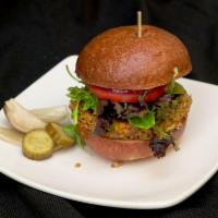 Veggie Burger (Vegan) · House made patty with nuts, seeds, vegetables and herbs, lettuce, tomato, red onion, hostel ...