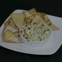 Artichoke Cheese Dip · Creamy blend of cheese, artichoke hearts, baby spinach, caramelized onion & red peppers, ser...
