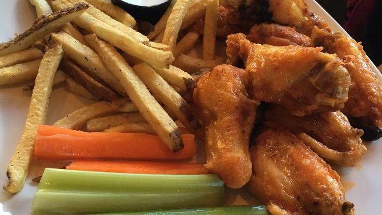 Buffalo Chicken Fries · Tossed and cut chicken tenders, medium or hot with blue cheese or ranch dressing.