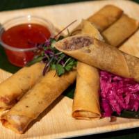(3) Large 10” Lumpia Shanghai (Eggroll) · Ground beef, minced carrots, garlic, sweet onion, oyster sauce. Served with sweet chili, ric...