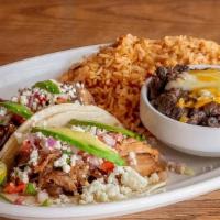 Carnitas Tacos · 2 corn tortillas | pork carnitas | cotija | pico de gallo | avocado