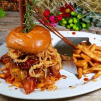 #6 Bbq Bacon Cheddar Burger · A fresh beef patty with - smoked bacon, cheddar cheese smothered with bbq sauce, topped with...
