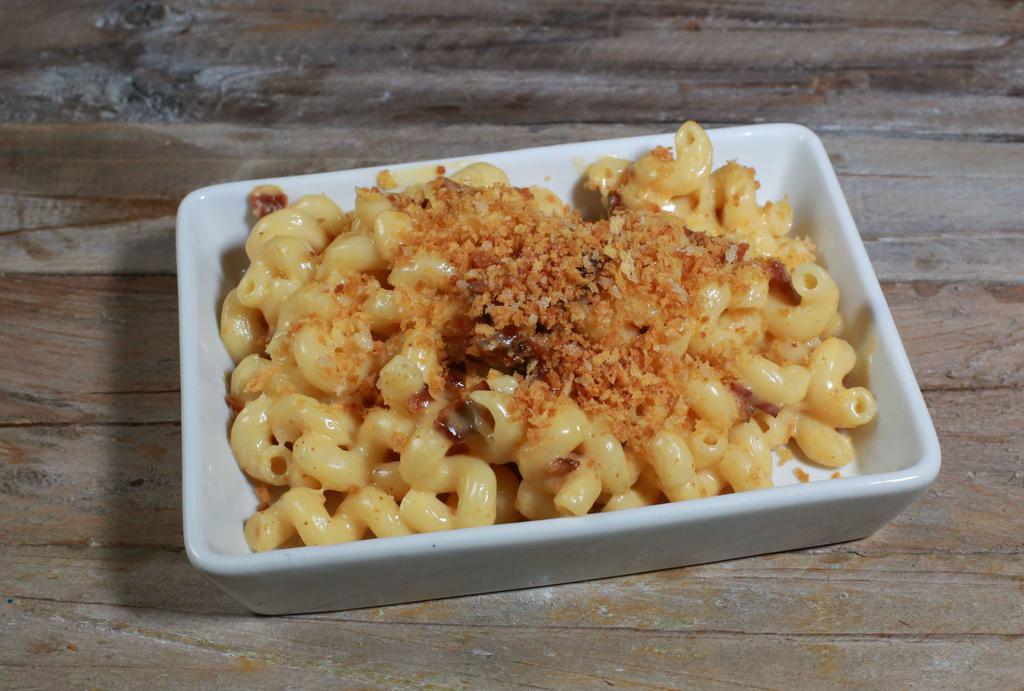 Bacon Mac · Capatavi pasta with rich and creamy cheese sauce and smoked bacon topped with toasted bread crumbs.